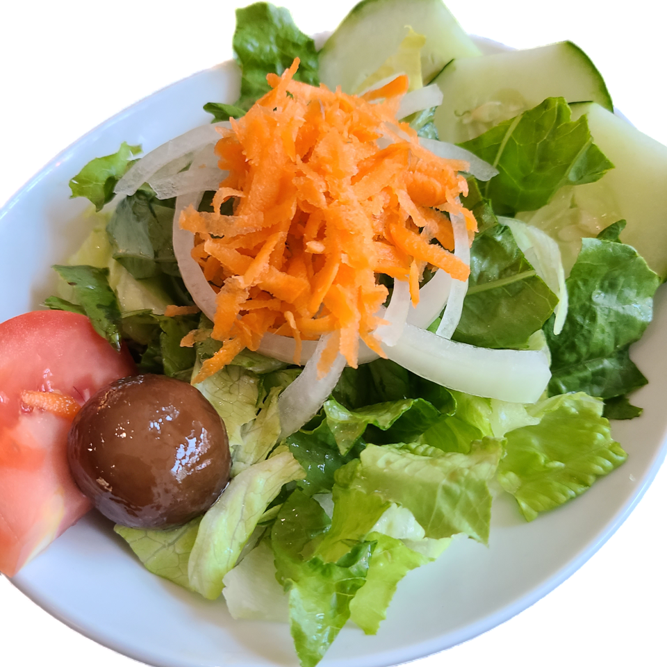 Garden salad with lettuce, cucumber, carrot, onion and tomato.